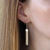 TASSEL EAR THREADER - NVMBR DCMBR - Earrings